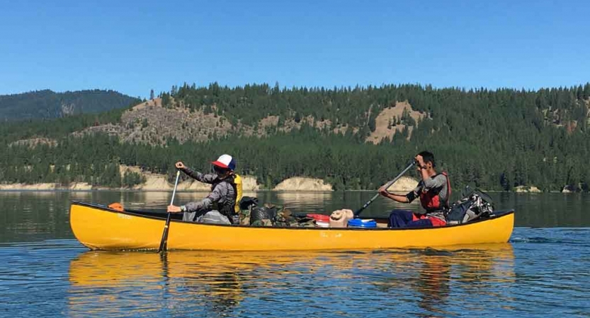 teens learning canoeing skills